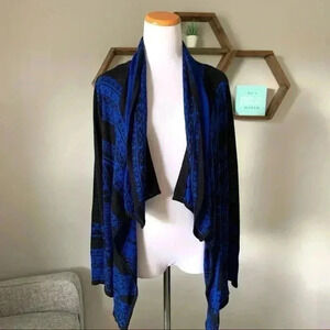 Say What? neon blue and black Aztec print shrug cardigan